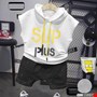 Sét áo thun sát nách phối nón SUP và quần kaki cho bé trai